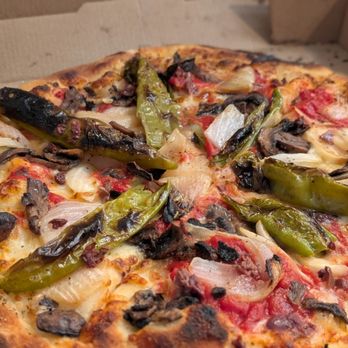 Anthony’s Coal Fired Pizza & Wings signature dishes Coal Oven Roasted Chicken WingsThe Original Coal Fired PizzaPaul & Young Ron Meatball Ricotta Pizza